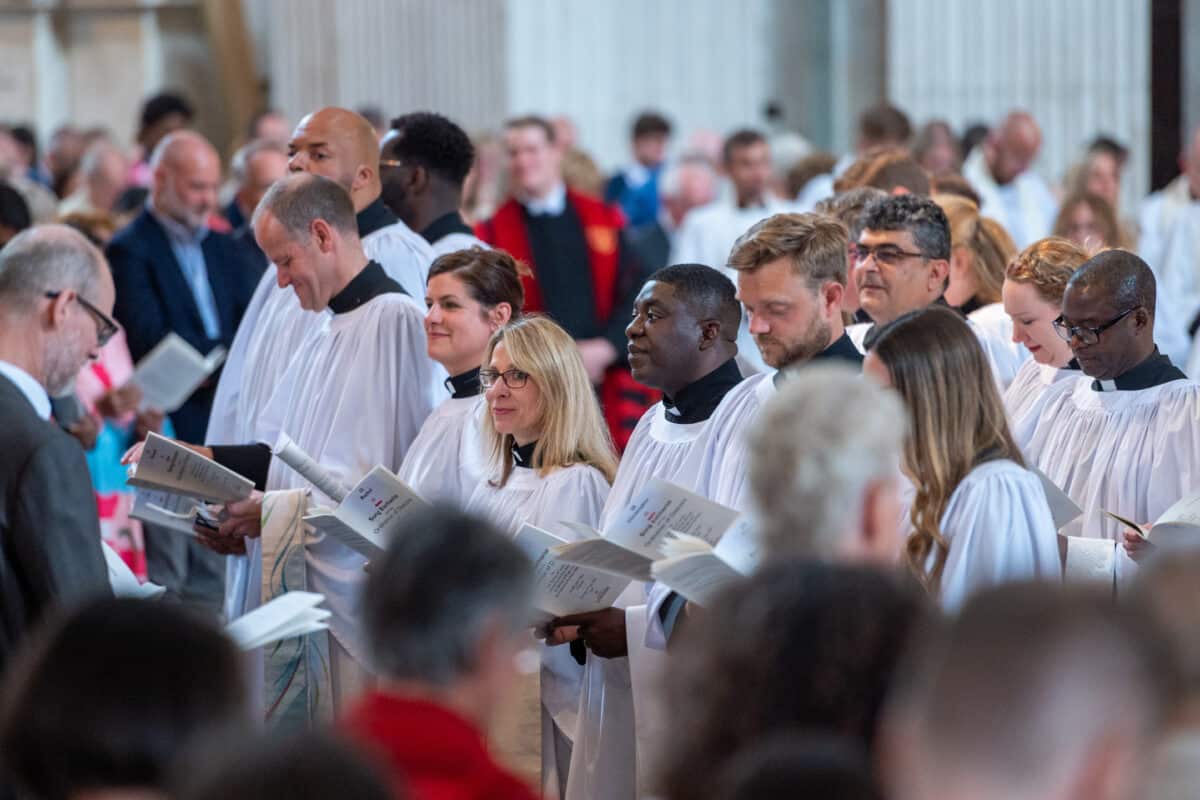 Image of clergy standing in a line at St Pauls cathedral