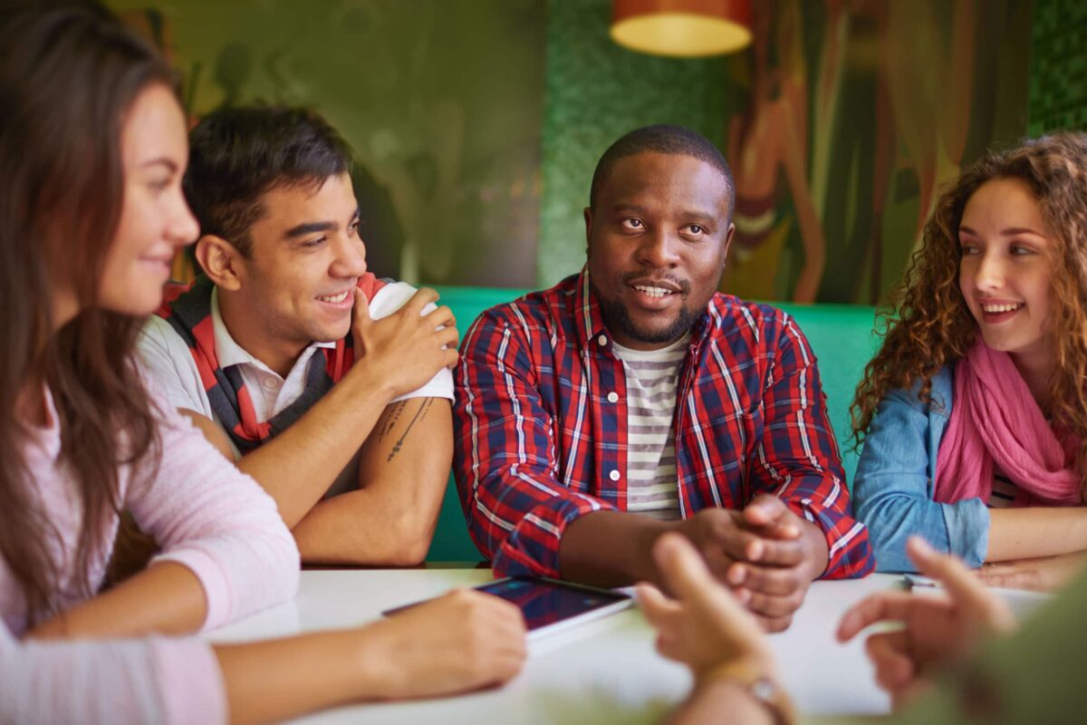 Adults talking during parents and toddlers' cafe ministry