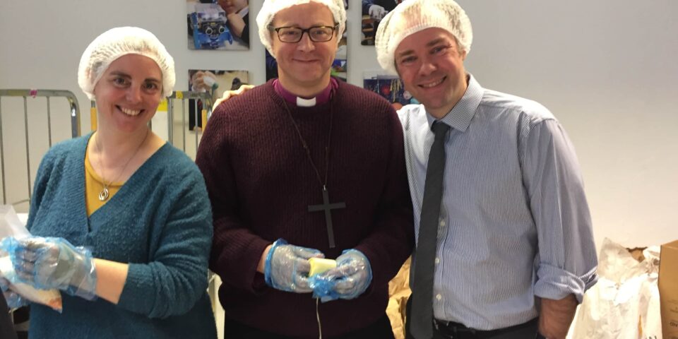 Bishop Rob lends a hand with Feed the Hungry at Barnet School.