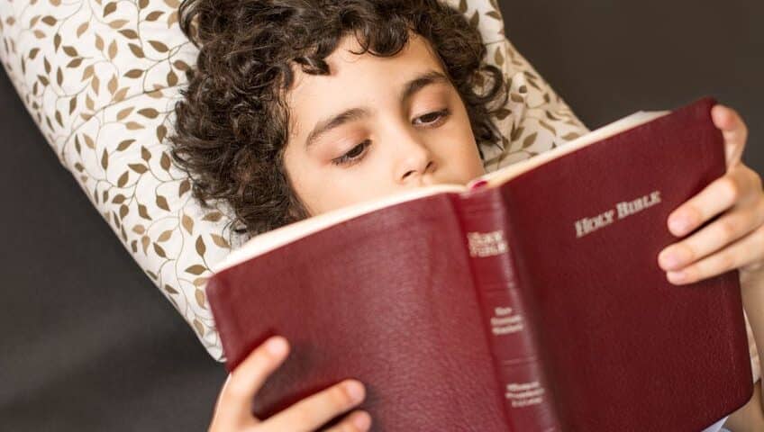 Child reading the Bible