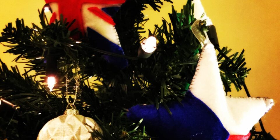 Christmas tree with Eurovision-themed decorations