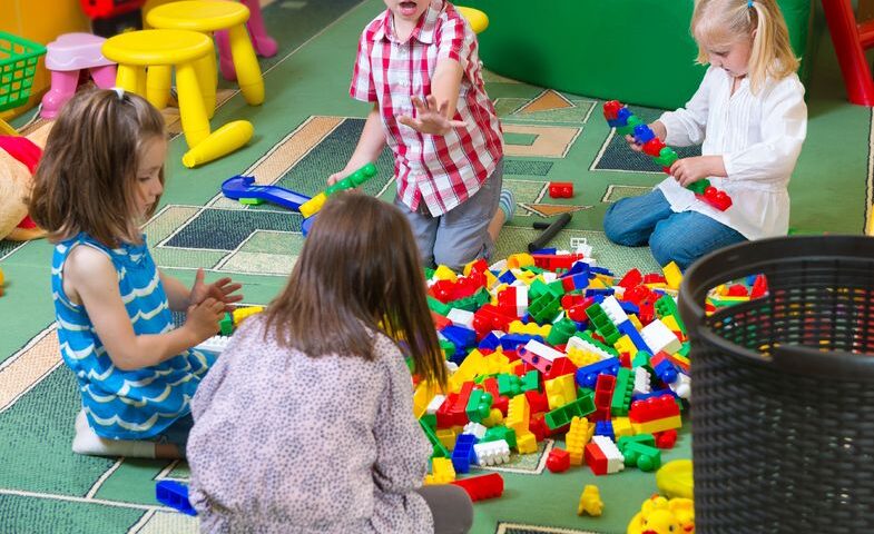 Group of children playing on floor