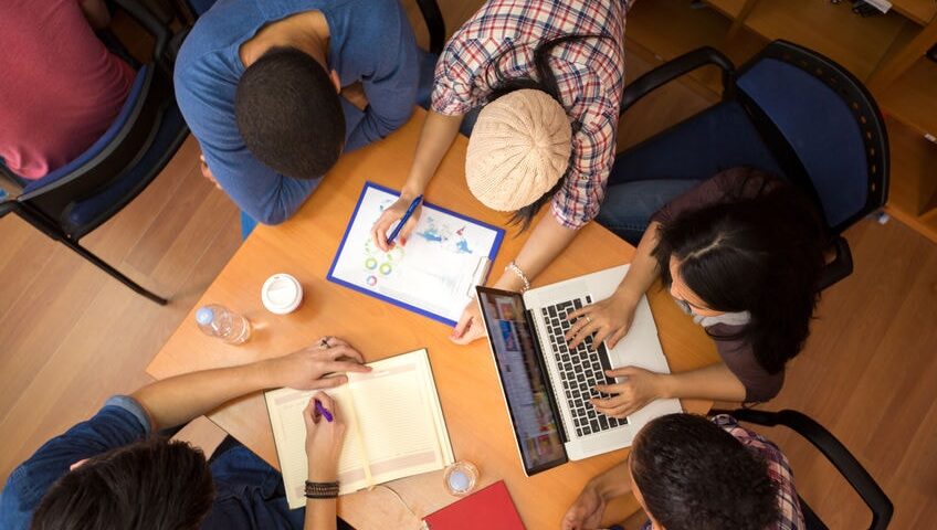 Group of colleagues working in team