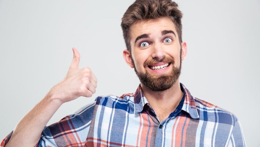 Thumbs up from funny looking man