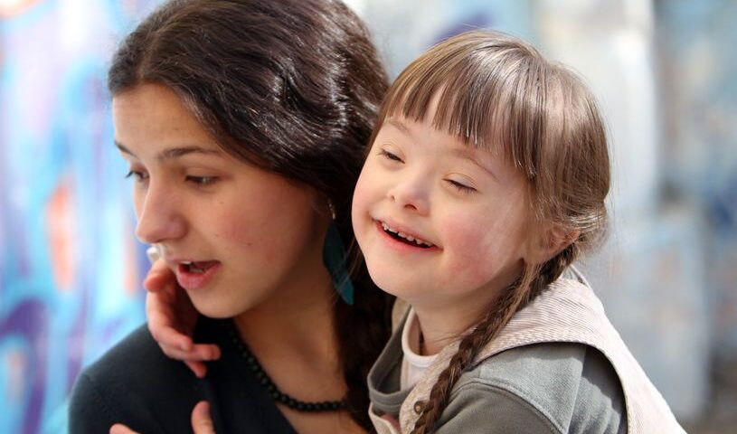 Young mother and child with Down Syndrome
