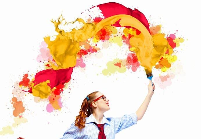 Young woman with paint brush