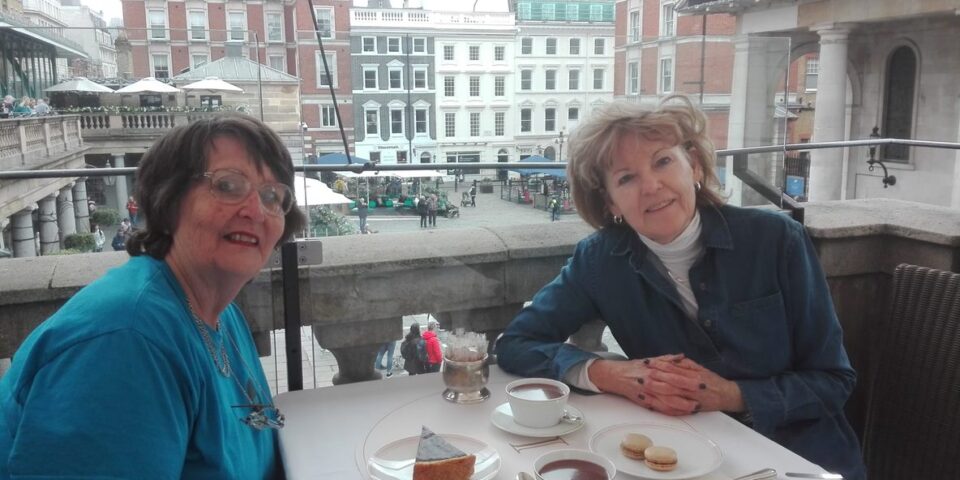 Home for Good volunteers eating together.