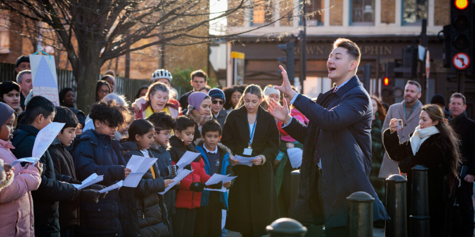 School children singing outside