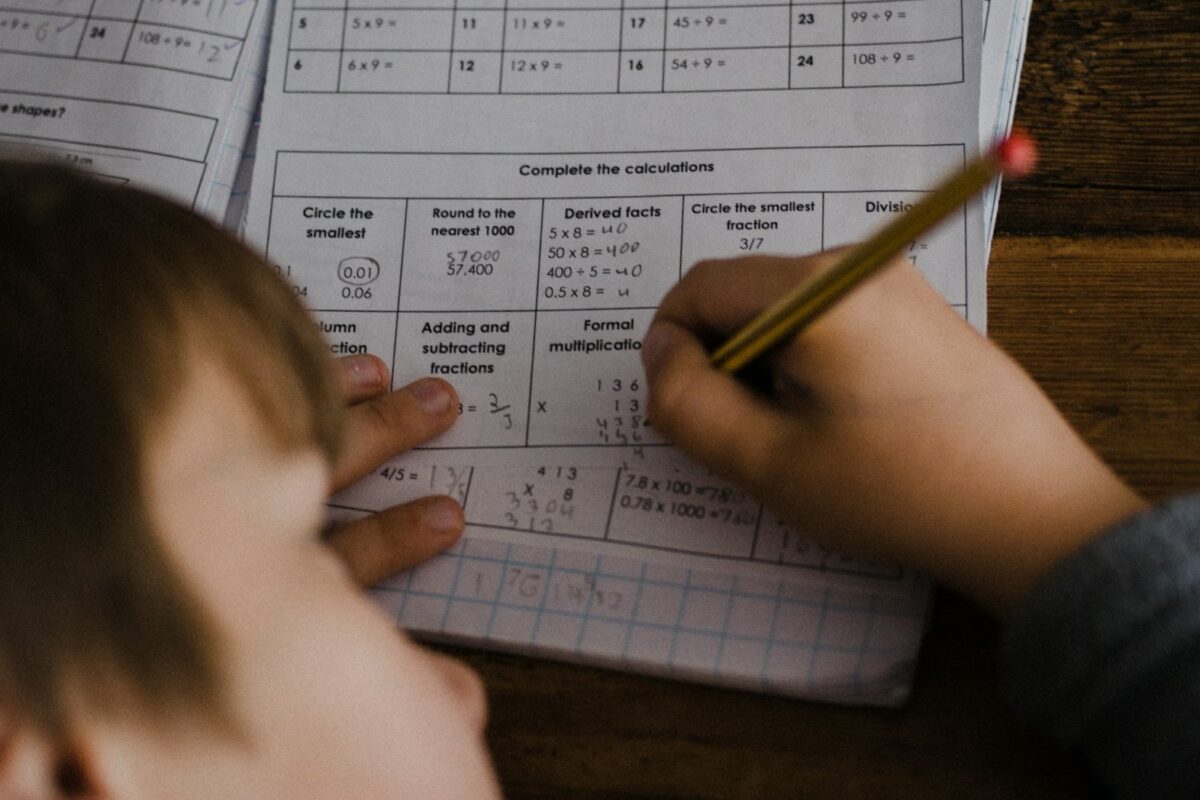 Photo of a child taking an exam.