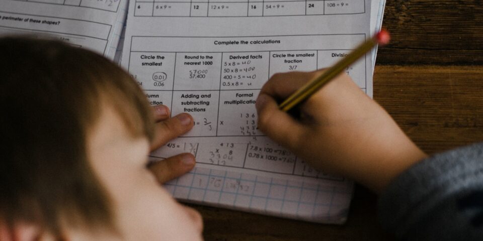 Photo of a child taking an exam.