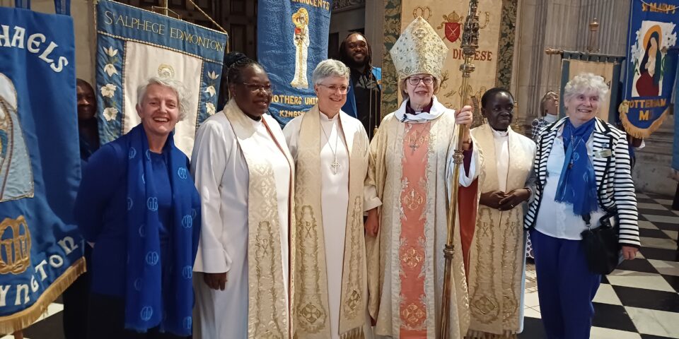 Group of seven women standing in St Paul's Cathedral, including Bishop Sarah and Bishop Emma