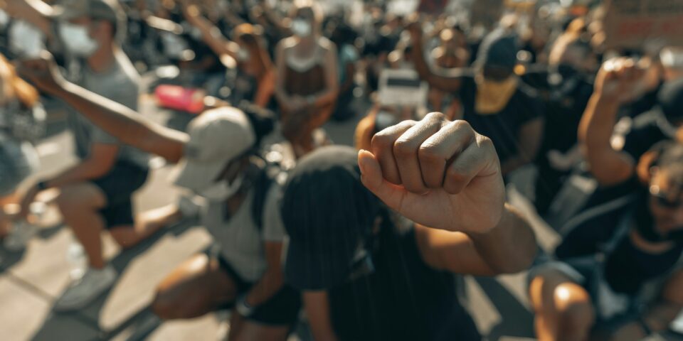 Protestors with fists in air