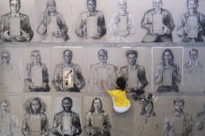 Es Devlin working on the portraits