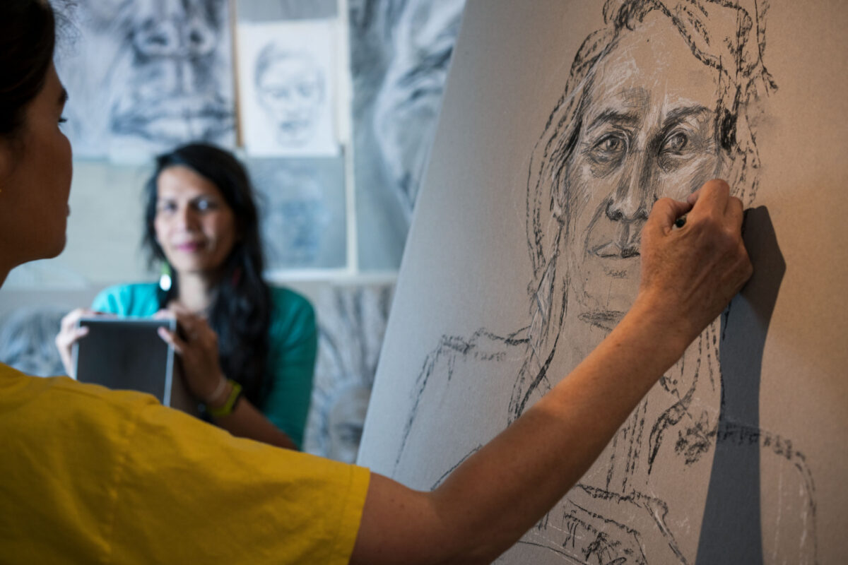 Es Devlin drawing a portrait