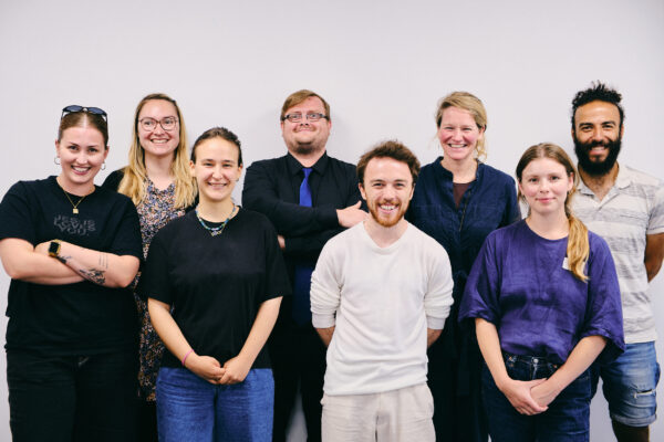 A group of first year apprentices smiling