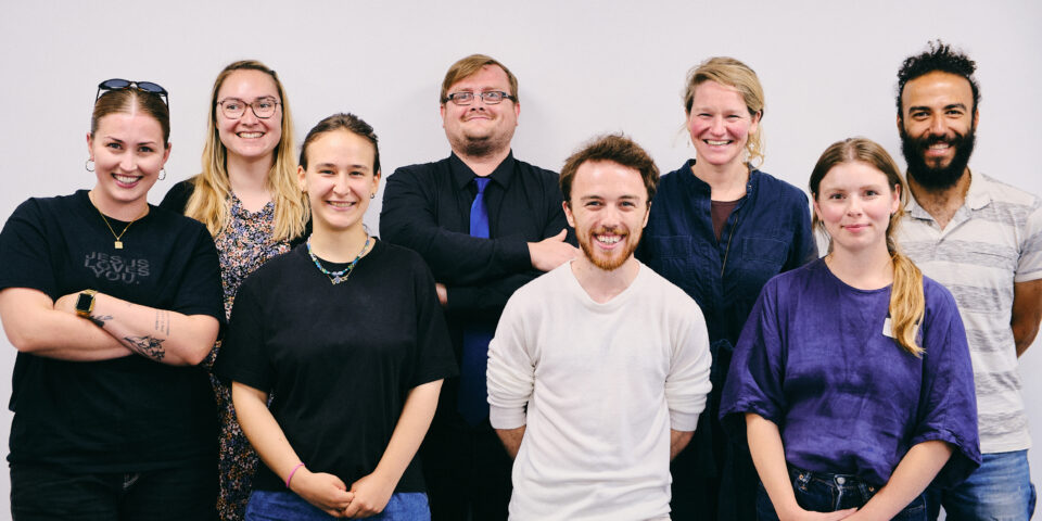 A group of first year apprentices smiling