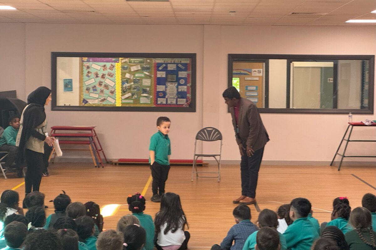 Bishop Anderson talking to school children