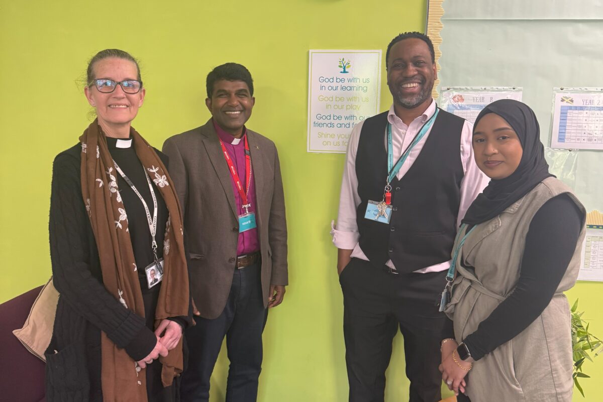 Bishop Anderson with school staff